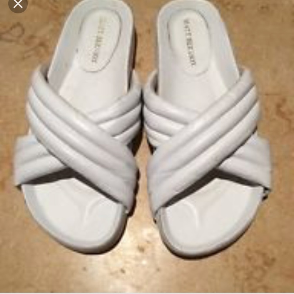 ISO Matt berson White cushioned raven slide